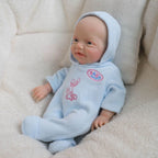 Boneca Bebê Reborn de Silicone Sólido Completo, 20cm, da Blue Bunny, Roupa Fofa de Coelho com Capuz Incluída